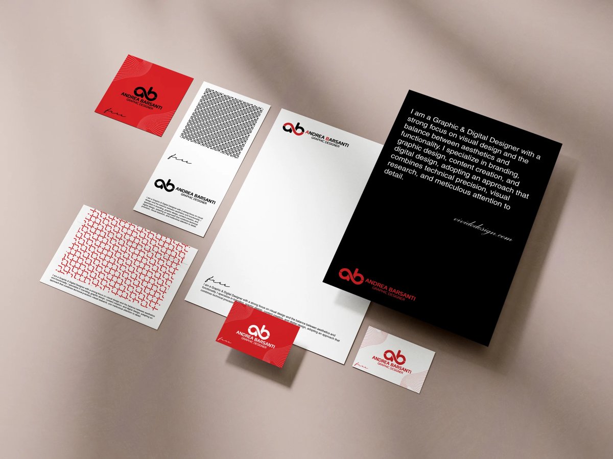 Branding mockup displaying stationery set with red and black business cards, letterhead, and branded documents arranged on beige background